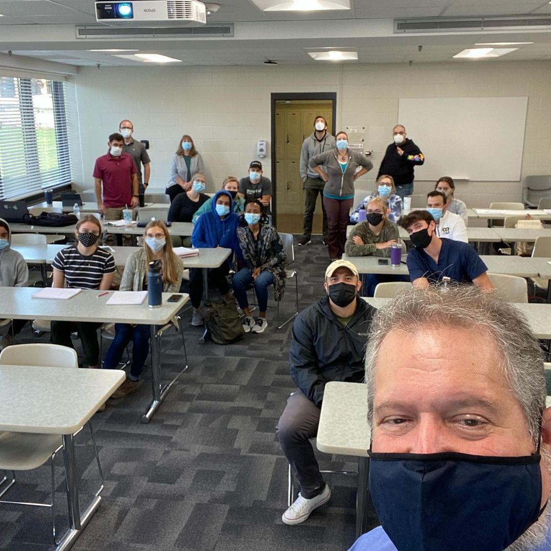 Jim Lawson taking a selfie with Century College/Concordia O&P students